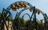 Two rollercoaster cars mid loop on The Smiler at Alton Towers